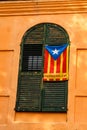 Catalan Flag hang up on the shutter in Tarragona