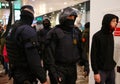 Catalan police mossos secure sants station during an independentist protest detail on officer