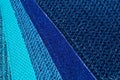 Catalog of fabric in blue turquoise shades. Fabric sample. Industry background. Royalty Free Stock Photo