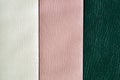 Catalog of white, pink, green imitation leather. Leatherette samples texture. Industry background Royalty Free Stock Photo