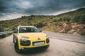 Citroen C4 Cactus Car Parked On Background Of Spanish Mountain Nature Landscape. The Citroen C4 Cactus Is A Mini