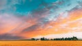 Catalonia, Spain. Summer Evening Sky Above Spanish Countryside Rural Wheat Field Landscape. Yellow Wheat At Sunset Time Royalty Free Stock Photo