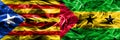 Catalonia vs Sao Tome and Principe copy smoke flags placed side by side. Thick colored silky smoke flags of Catalan and Sao Tome a