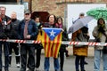 CATALONIAN WOMAN STAND WITH CATALONIA FLAG