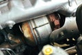 Catalytic converter on diesel engine in a car, close up a car catalytic converter for filtration carbon monoxide.