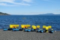 Catamaran boats for rent on a lake shore