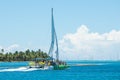 Catamaran in Caribbean sea going to Saona island with happy tourists