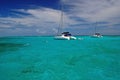 Catamaran on clear turquoise water Royalty Free Stock Photo