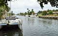 Catamaran docked on serene waterway in Florida