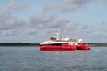 Catamaran ferry on Wadden Sea near Amrum island, North Frisia, Schleswig-Holstein, Germany Royalty Free Stock Photo