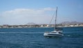 Catamaran leaving Corralejo Fuerteventura coastline in background.