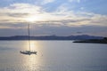 Catamaran moored at sunset and jetliner landing in Palma Royalty Free Stock Photo