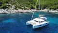 Catamaran parked in a small Adriatic bay Royalty Free Stock Photo