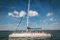 Catamaran with passengers at sea