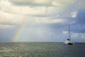 Catamaran at Rodney bay with rainbow in the backround, Saint Lucia, Caribbean sea Royalty Free Stock Photo