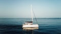 Catamaran sailboat on the blue calm ocean in the Bahamas