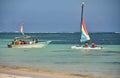 Catamaran sailboat and fishing boat Royalty Free Stock Photo