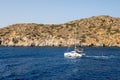 Catamaran sailing on Aegean Sea near Ios Island in Greece Royalty Free Stock Photo
