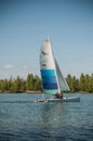 Catamaran sailing on the lake of reiningue Royalty Free Stock Photo