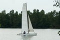 Catamaran sailing on the lake of reiningue Royalty Free Stock Photo