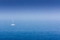 Sailboat sailing in a blue sea