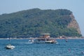 catamaran sails near the shore of Sveti Nikola Island