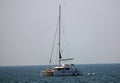 Catamaran sails in the sea