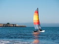 Catamaran sport sailing, red sail Royalty Free Stock Photo