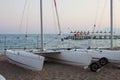 Catamaran stands on the sandy beach of the sea Royalty Free Stock Photo