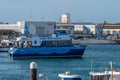 Catamaran vessel named Odisseia Viva with tourists sailing in Peniche, Portugal