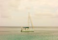 A catamran motoring in the bequia channel Royalty Free Stock Photo