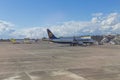 People boarding to airplane on Catania airport