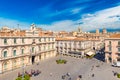 Cityscape of Catania in the morning. People walking on the main square in the historical city center