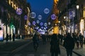 Busy Etnea street decorated with festive New Year illumination lights, Catania, Sicily