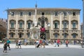 CATANIA, SICILY - JUNE 19, 2019: tourists in Piazza del Duomo square with the Elephant fountain obelisk and the city hall palace