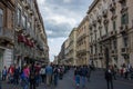 Catania via etnea, view of baroque city center with walking people