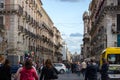 Catania via etnea view toward central square, walking people and cars around Royalty Free Stock Photo