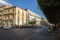 Catania via etnea street from central park, historical buildings and urban life with cars