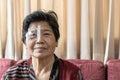 Cataract elderly patient, Asian old senior woman having eye care treatment on Age-related eye diseases, AMD Royalty Free Stock Photo