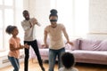 African parents and kids playing hide and clap at home Royalty Free Stock Photo