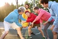 Catch it. positive delighted teenager boys play basketball, want to win