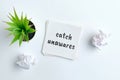 Catch unawares - english time idiom hand lettering on wooden blocks