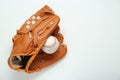 Catcher`s mitt and baseball ball on white background, top view with space for text. Sports game Royalty Free Stock Photo