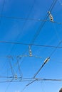 catenary of train under blue sky Royalty Free Stock Photo