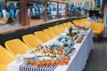 Catering banquet table with different food snacks and appetizers on corporate christmas birthday party event