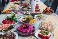 Catering banquet table with different food snacks and appetizers on corporate christmas birthday party event