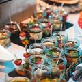 Catering banquet table with different food snacks and appetizers on corporate christmas birthday party event