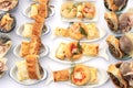 Catering : buffet of Italian pretzels  , small pizzas with tomato and mozzarella, rustic with wurstel, pizzette puff pastry, Royalty Free Stock Photo