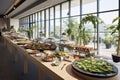 Catering buffet meal on a white long table in a modern restaurant