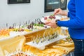 Catering buffet table with food and snacks for guests of the event. Group of people in all you can eat. Dining Food Celebration Pa Royalty Free Stock Photo